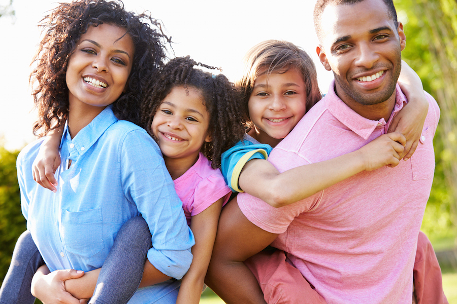 African-american family, smiling.