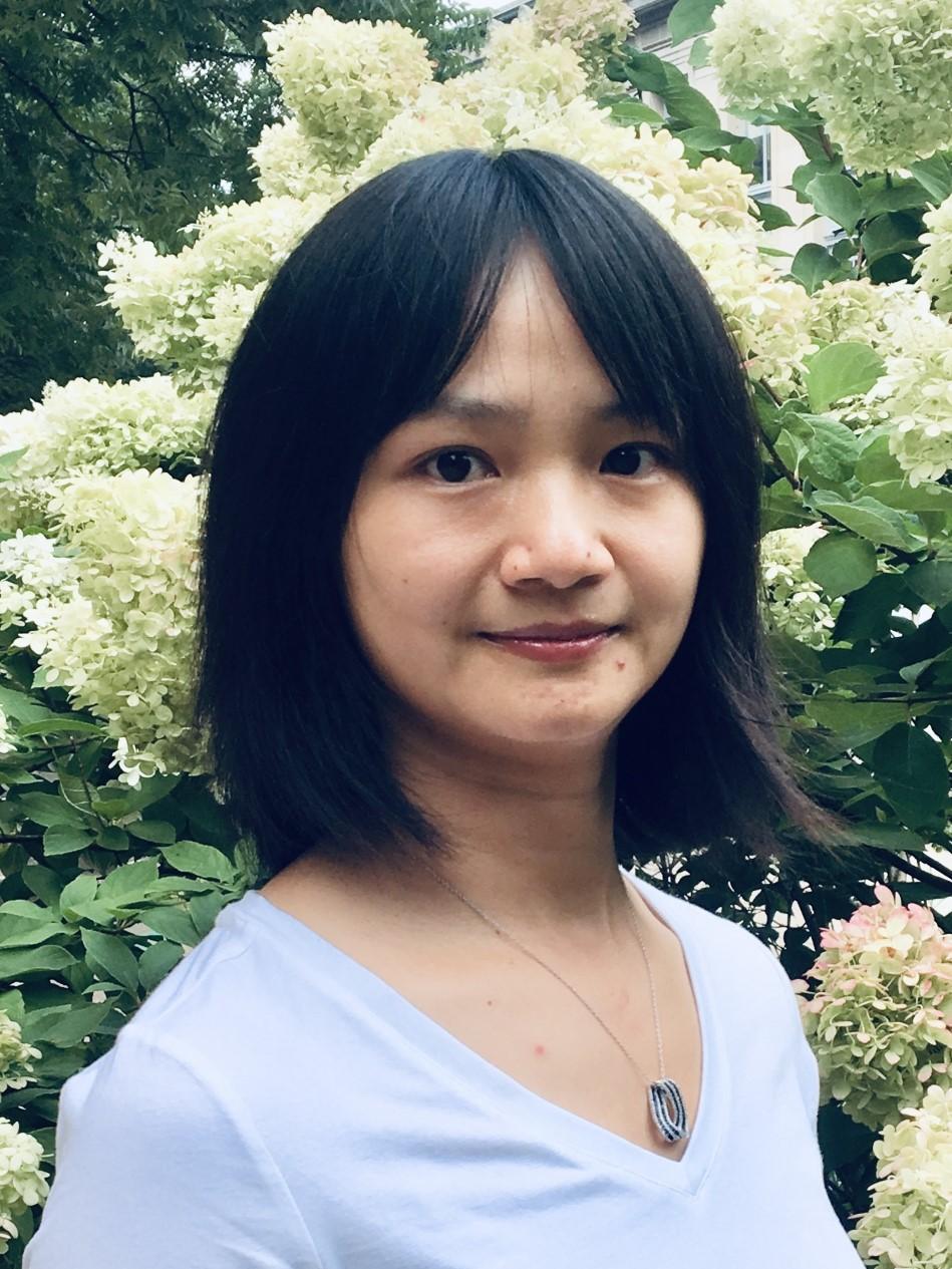 Liying Luo, assistant professor of sociology and demography and associate director of the Center for Social Data Analytics, with short black hair and light blue shirt.