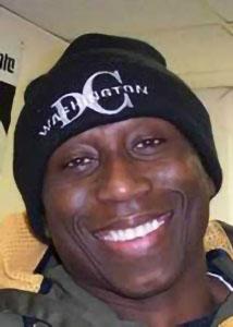 Headshot of Francis Dodoo wearing a black beanie hat in a casual setting.
