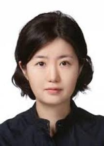 Headshot of Soomi Lee with mid-length black hair wearing a black top in front of white background.