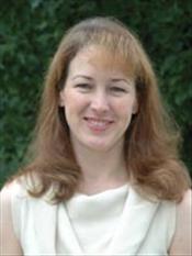 Headshot of Dr. Lisa Gatzke-Kopp with light brown hair and a white blouse.
