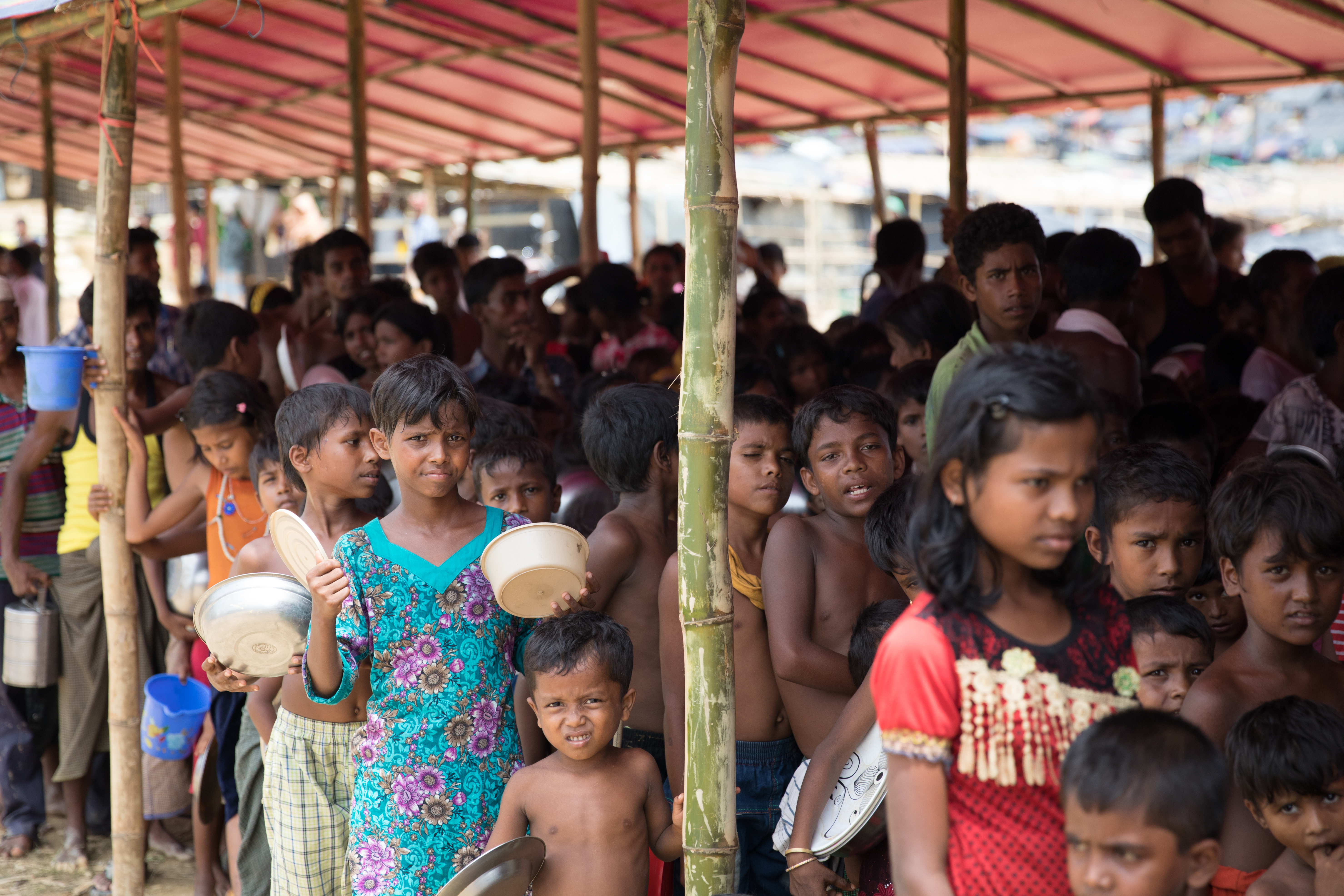 Photo of dozens of Rohingya children in a refugee camp in Bangladesh.