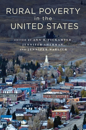 Photo of the book cover with buildings in a town.