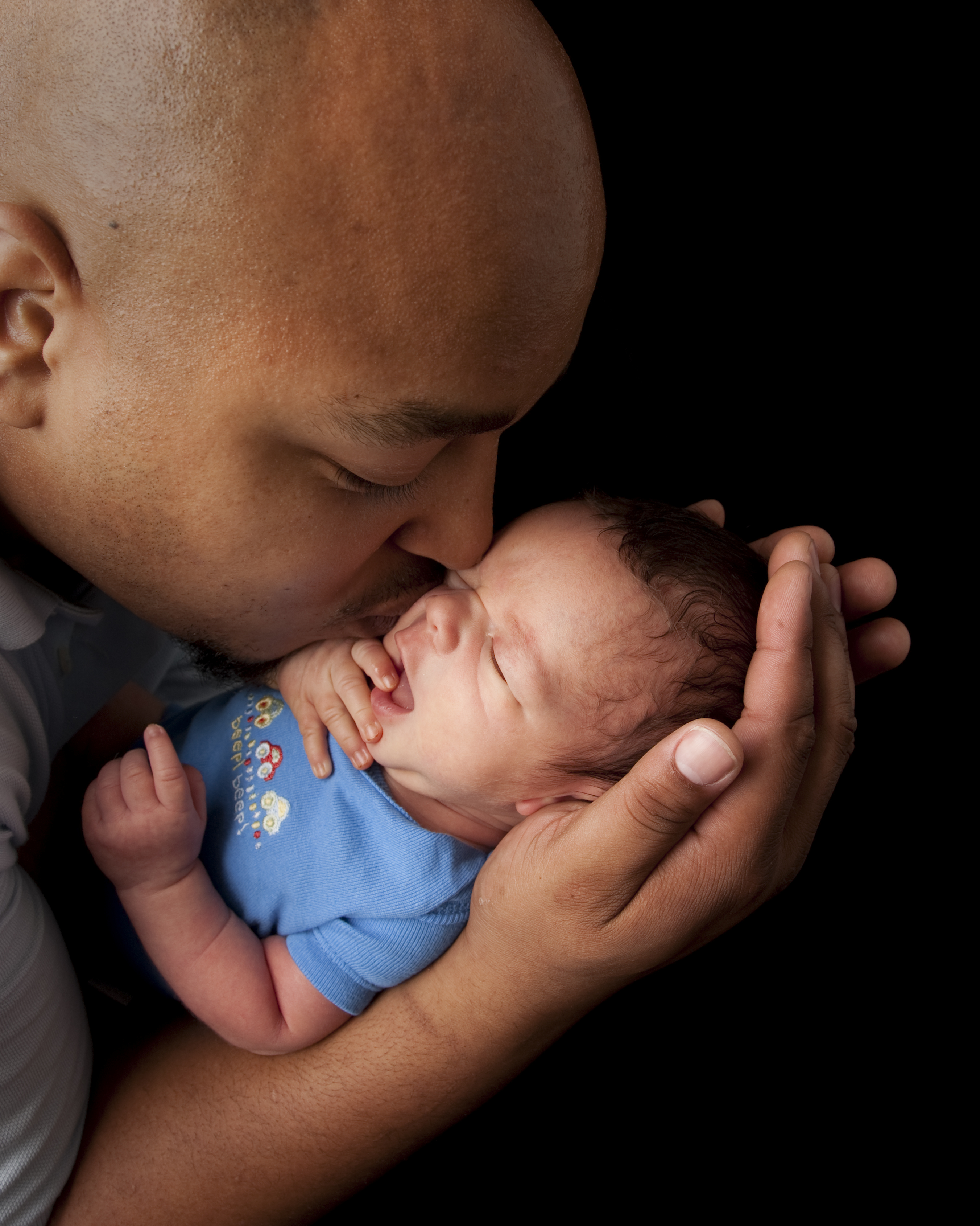 Photo of an African American man and baby.