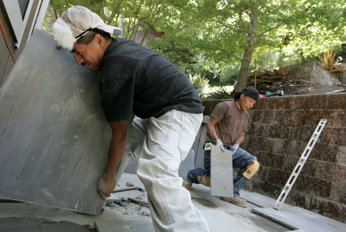Landscape workers from Guatemala at a job in San Rafael, California