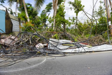 Photo from Hurricane Maria showing downed power lines and other debris.
