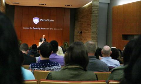 Photo of a presentation by the Center for Security Research and Education at Penn State.