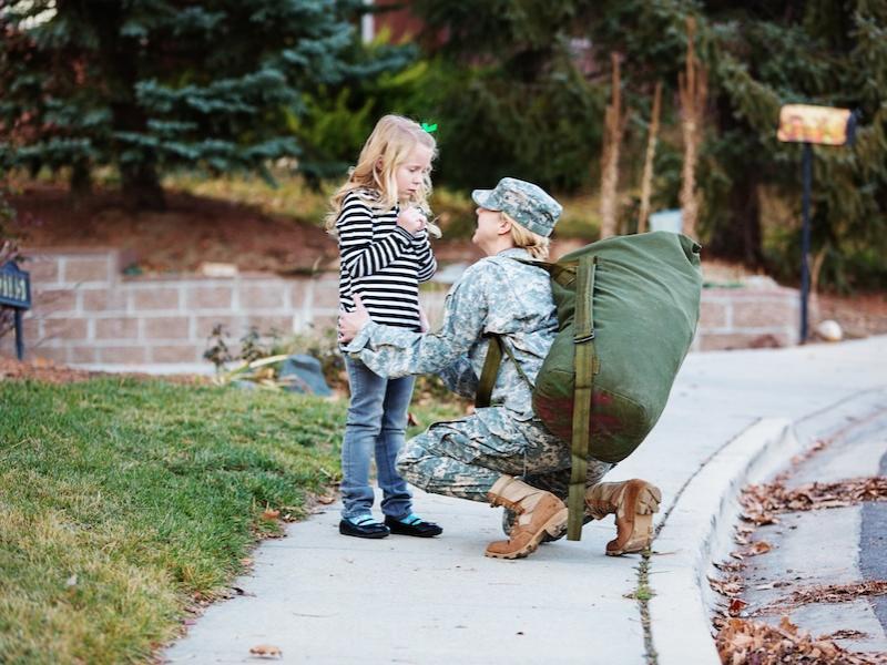 Military mom saying goodbye to young daughter
