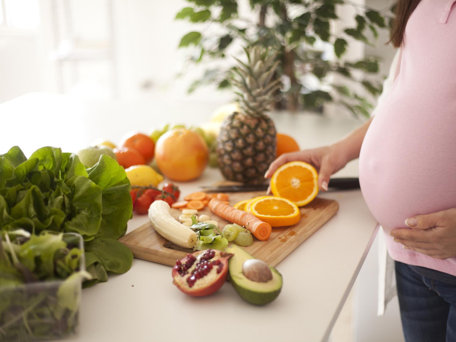 Pregnant woman with food