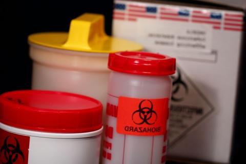 Photo of various containers for biohazardous materials.
