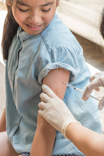 Young girl getting HPV vaccine