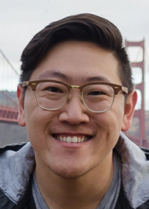 Headshot of Jonathan Park with black hair, glasses, gray shirt, and black jacket.