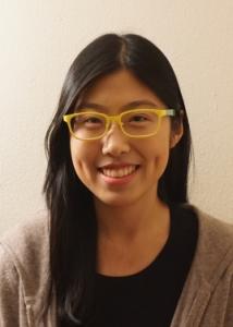 Headshot of Meng Chen with long black hair, glasses, black top, and gray sweater.