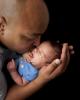 Photo of an African American man and baby.